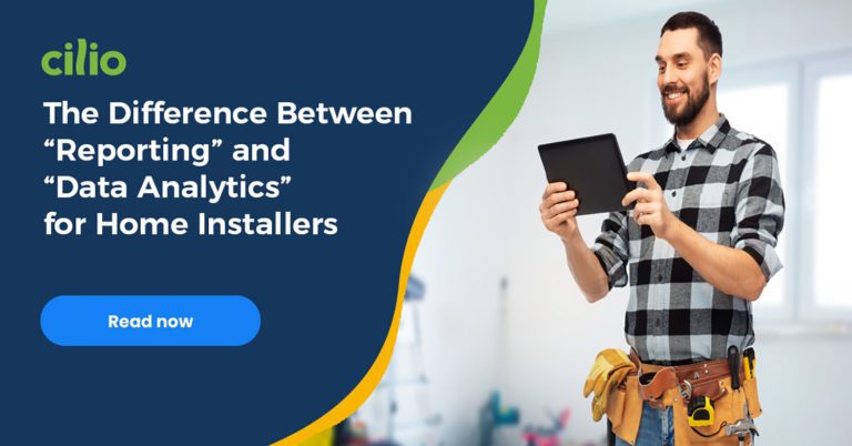 Installer looking at a tablet device to review analytics