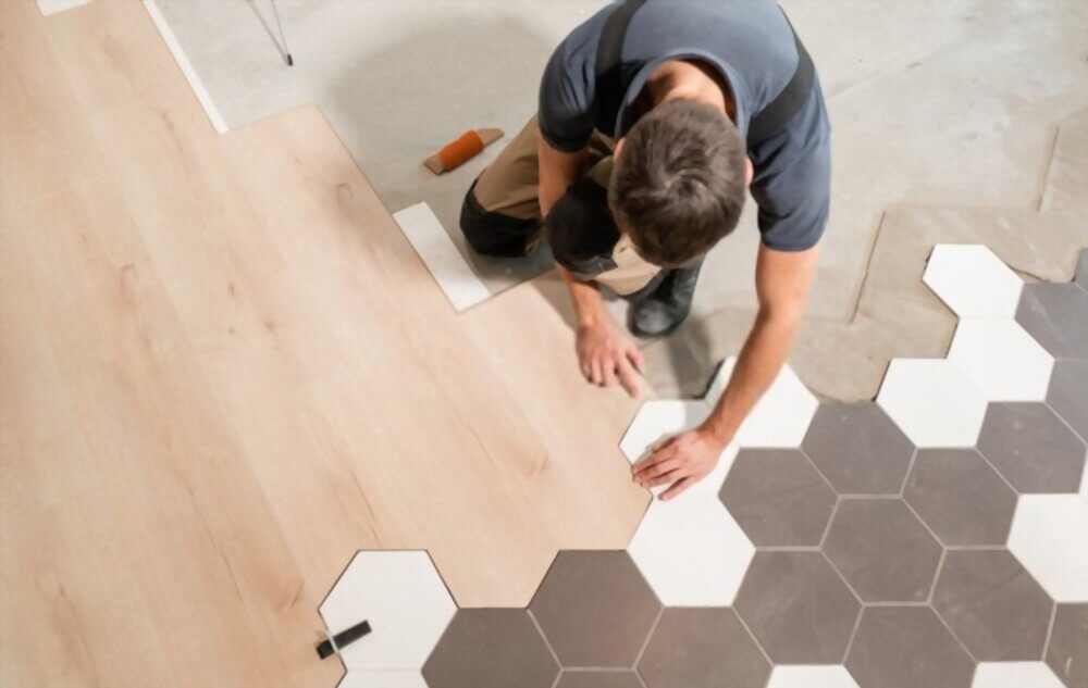 man-installing-flooring